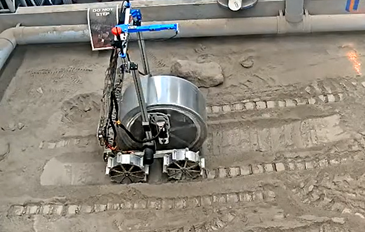 Bucket drum rover operating in regolith testbed